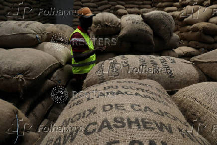 FILE PHOTO: Cashew nut warehouse operations during COVID-19 in Abidjan