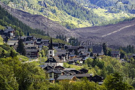 Swiss village almost buried after collapse of glacier