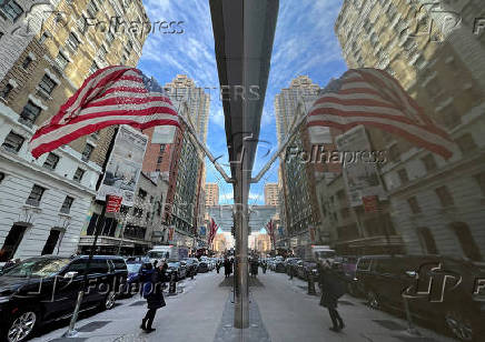 FILE PHOTO: People walk on the streets of New York City