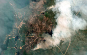 A satellite image shows smoke rising from Shoe Fire burning near Little Bear Lake, in Saskatchewan