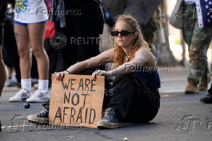 Protests against federal immigration sweeps continue in Los Angeles