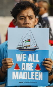 Pro Palestinians protest outside the US embassy in Jakarta