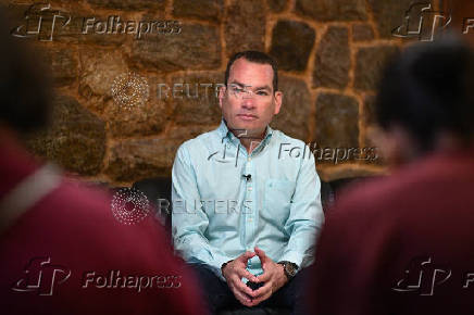 Venezuelan opposition leader Tomas Guanipa speaks to Reuters, in Caracas