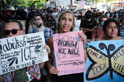 Rally in solidarity with Los Angeles protests against federal immigration sweeps, in Austin