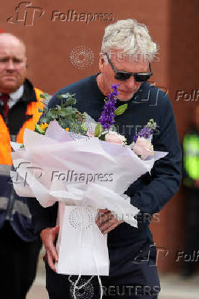 Fans pay their respects to soccer player Diogo Jota, at Anfield Stadium in Liverpool