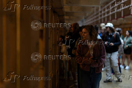 Visitors tour the Alcatraz prison complex located on Alcatraz Island in San Francisco Bay