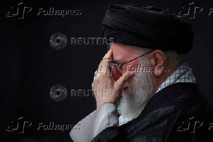 FILE PHOTO: Iran's Supreme Leader Ayatollah Ali Khamenei attends a mourning ceremony for the deaths of Iranian military commanders and scientists, in Tehran