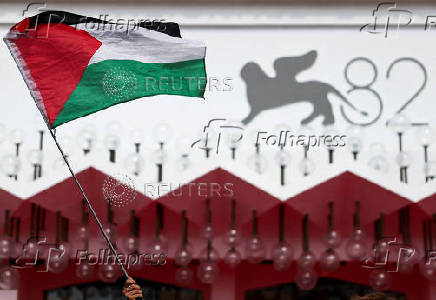 Supporters gather to call for Palestinian protest during the 82nd Venice Film Festival