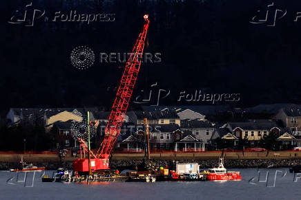 FILE PHOTO: Aftermath of American Eagle flight 5342 crash in the Potomac River near Ronald Reagan Washington National Airport
