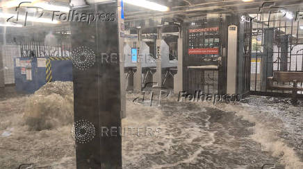 A view shows a flooded subway station in New York