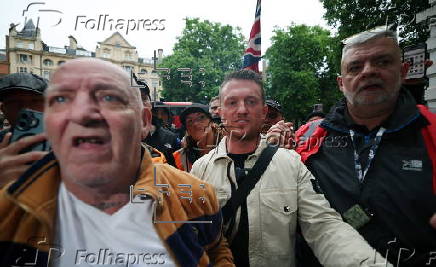 Political activist Tommy Robinson faces court over journalist harassment