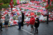 Fans pay their respects to late soccer player Diogo Jota, at Anfield Stadium in Liverpool