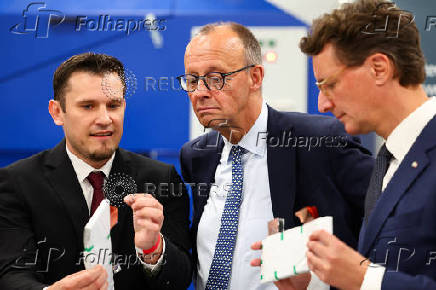German Chancellor Friedrich Merz visits a battery cell production facility in Muenster