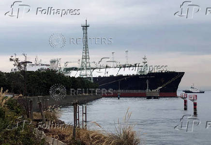 FILE PHOTO: Japan to step up LNG purchases for emergency reserve from January, industry ministry sources say