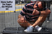 PETA offers 10 MYR (Malaysia Ringgit) or 02 Euro to be caged like an animal for one minute in launch of worldwide campaign in Kuala Lumpur