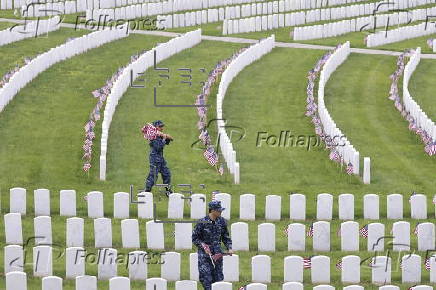 Flags placed on military veteran graves for Memorial Day in Brooklyn