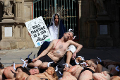 Protesters demonstrate for the permanent end of bullfighting and running of the bulls, a day before the start of the the San Fermin festival, in Pamplona