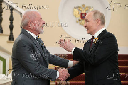 Russian President Putin greets foreign leaders before parade marking WW2 victory anniversary in Moscow