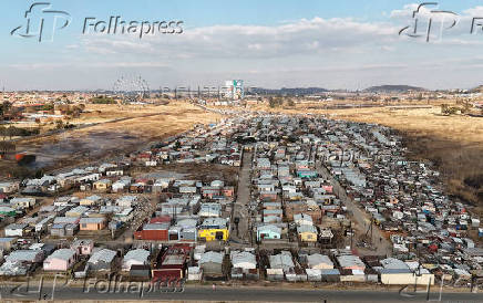 A drone view shows a residential area in Soweto,