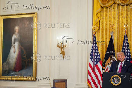 U.S. President Trump participates in a signing ceremony for the 