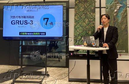 Japanese small satellite startup Axelspace's CEO Yuya Nakamura speaks at a press conference, in Tokyo