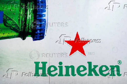 FILE PHOTO: The logo of Heineken beer is seen on a delivery truck