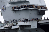 Britain's HMS Prince of Wales aircraft carrier arrives at Marina Bay Cruise Centre in Singapore