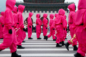 'Squid Game' characters parade through central Seoul