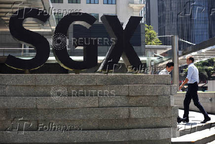 FILE PHOTO: An SGX sign is pictured at Singapore Stock Exchange