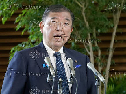 Japan's Prime Minister Shigeru Ishiba speaks to media after a meeting with cabinet ministers to discuss Japan's strategy in dealing with U.S. tariffs, in Tokyo