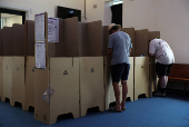 People vote at a pre-polling centre in Sydney