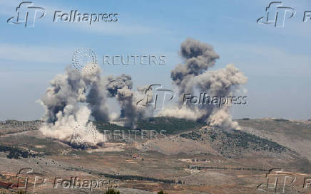 Smoke billows from Nabatieh district, following Israeli strikes, according to two Lebanese security sources, as seen from Marjayoun