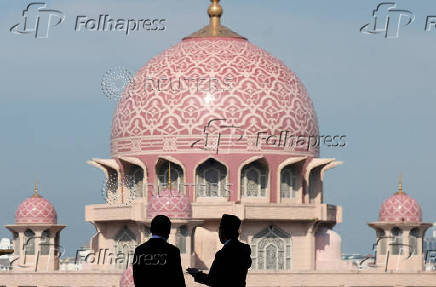 The Prime Minister of Laos meets his Malaysian counterpart during his visit to Malaysia
