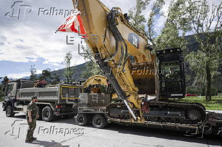 Swiss village buried after collapse of glacier