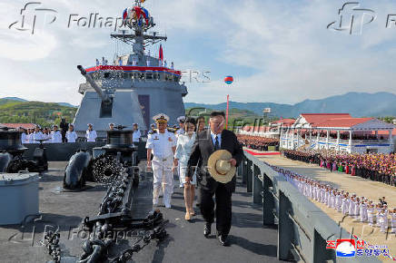 North Korean leader Kim Jong Un attends the launching ceremony of a warship that had been damaged upon its first attempt to launch