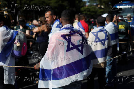 Brazilians attend an Evangelical march to celebrate Corpus Christi in Sao Paulo