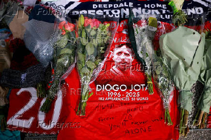 Fans pay their respects to late soccer player Diogo Jota, in Liverpool