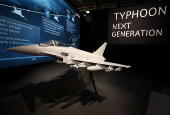 A model of BAE Systems Typhoon military jet is seen on display in a room at their Warton factory in Warton