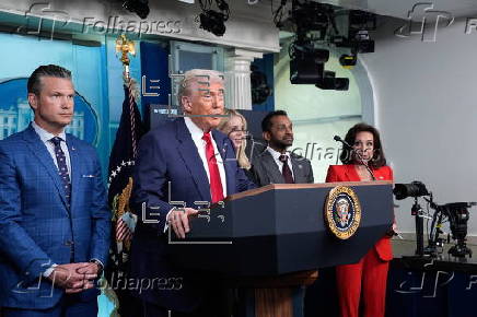 US President Donald Trump addresses the media at the White House