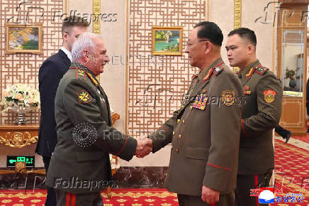 North Korea's Defense Minister No Kwang-chol greets Russia's Deputy Defence Minister Viktor Goremykin, in Pyongyang