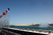 Egypt's Suez Canal Authority removes solid waste from the waters in the passage in Ismalia