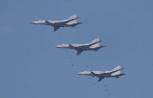 FILE PHOTO: Tupolev Tu-22 M3 strategic bombers drop bombs during the Aviadarts competition, as part of the International Army Games 2018, outside Ryazan