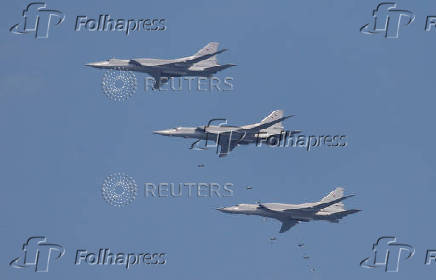 FILE PHOTO: Tupolev Tu-22 M3 strategic bombers drop bombs during the Aviadarts competition, as part of the International Army Games 2018, outside Ryazan