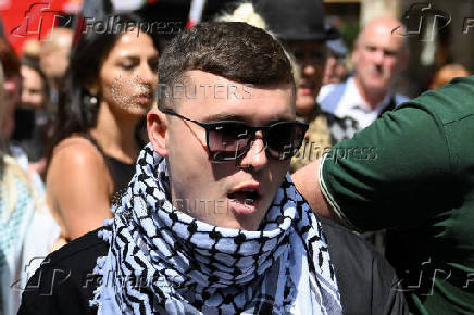 Member of Irish rap group Kneecap in UK court on terrorism charge