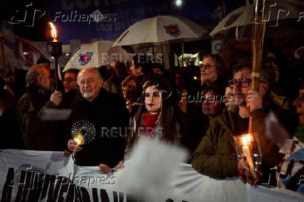 Argentine university teachers and students march during a protest against Argentine President Javier Milei's education budget, in Buenos Aires