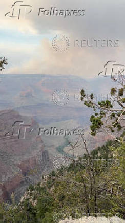 Smoke rises during the wildfires in the North Rim, as seen from the Grand Canyon village