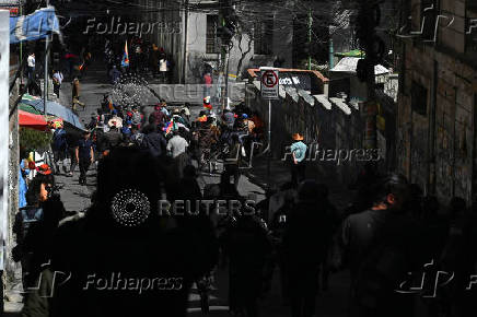 Supporters of Evo Morales's candidacy clash with police, in La Paz
