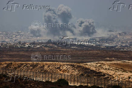 Smoke rises after an explosion in Gaza, as seen from the Israeli side of the Israel-Gaza border