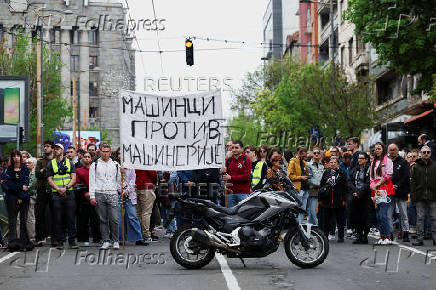 Students block access to the state broadcaster Radio Television of Serbia (RTS), demanding fair and unbiased reporting, in Belgrade