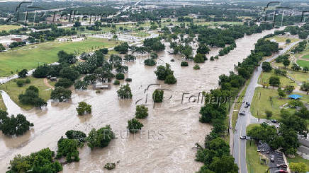 A drone view shows the swollen San Gabriel river, in Georgetown